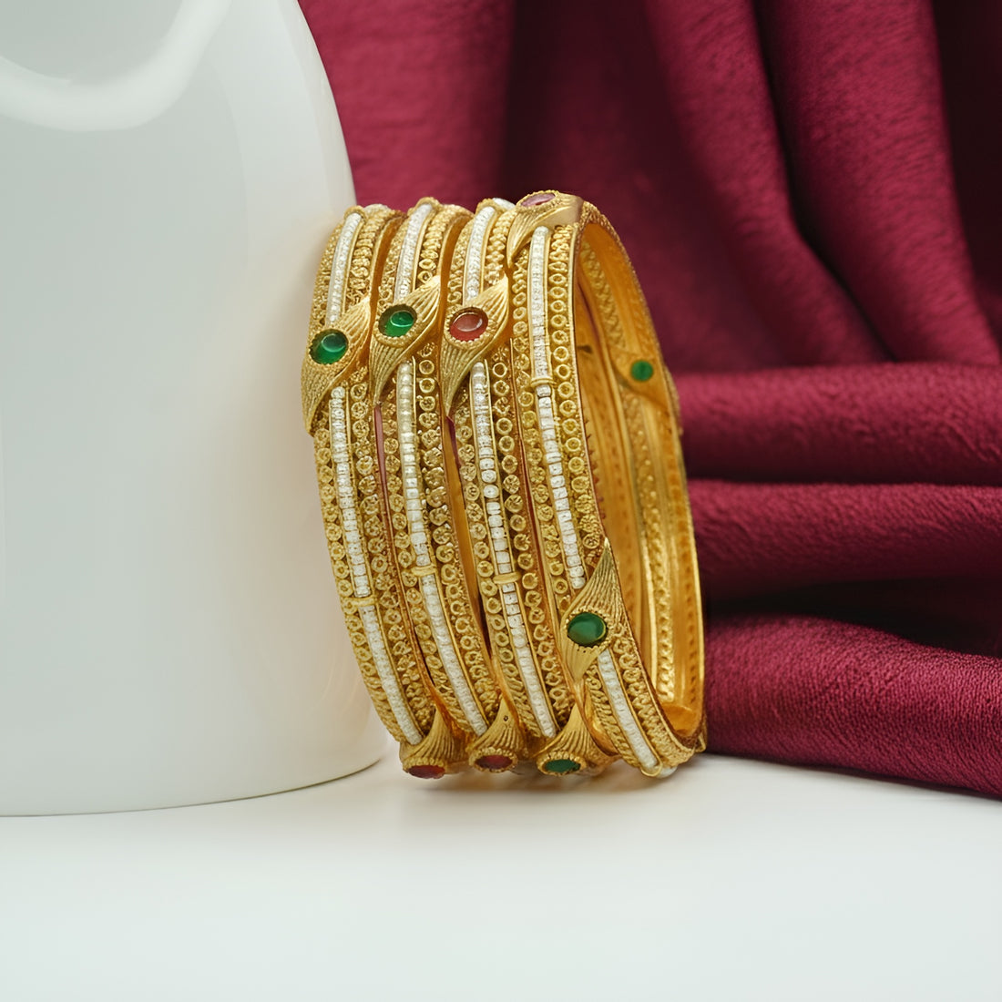Trending Designer Gold Bangles with Pearl Ruby Emerald Stones for Bridal & Festive Look