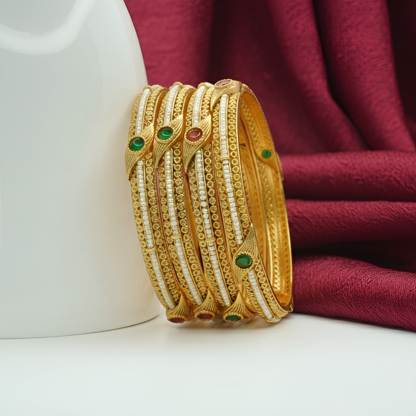 Trending Designer Gold Bangles with Pearl Ruby Emerald Stones for Bridal & Festive Look
